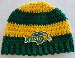 Crochet hats plain and with team names, also scarves.